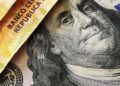 Dolar roste navzdory intervencím centrální banky a amerického ministerstva financí